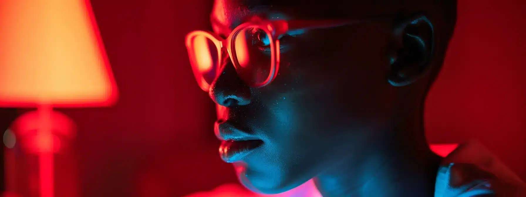 a visually impaired individual using a website with vibrant contrasting colours for enhanced accessibility.